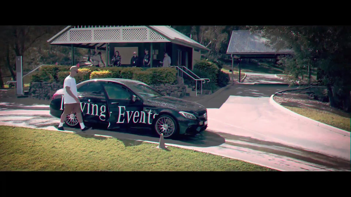 Pat beside a Mercedes Driving Events car