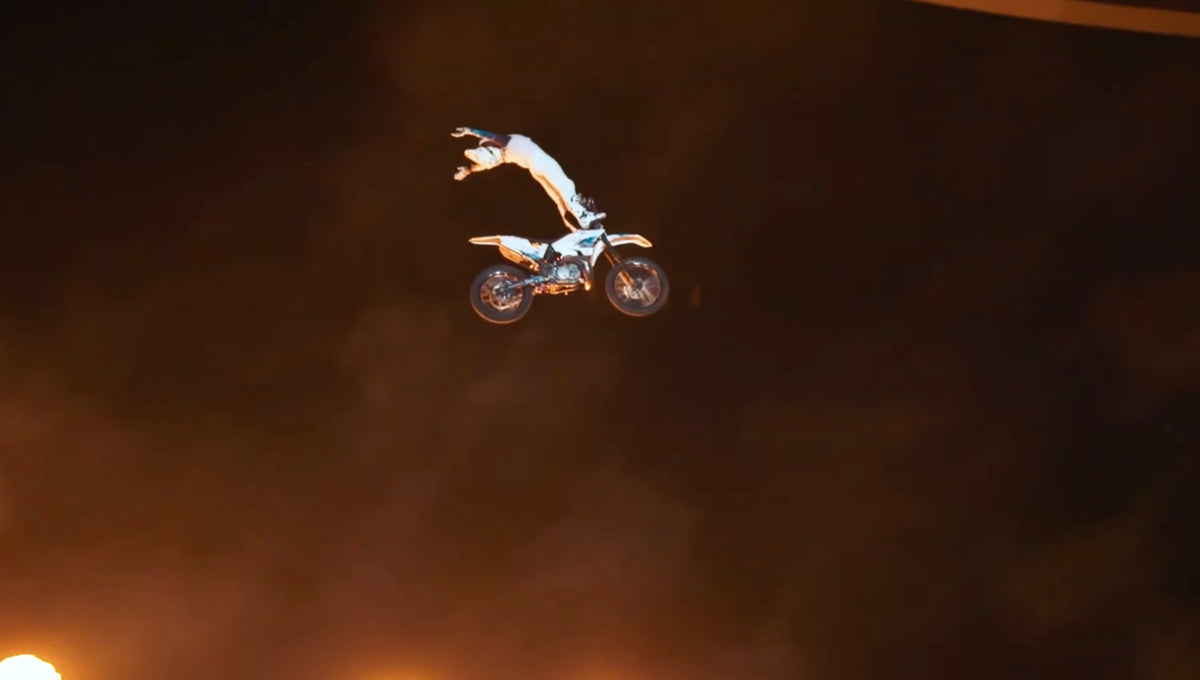 Pat Bowden performing a freestyle motocross trick at the launch