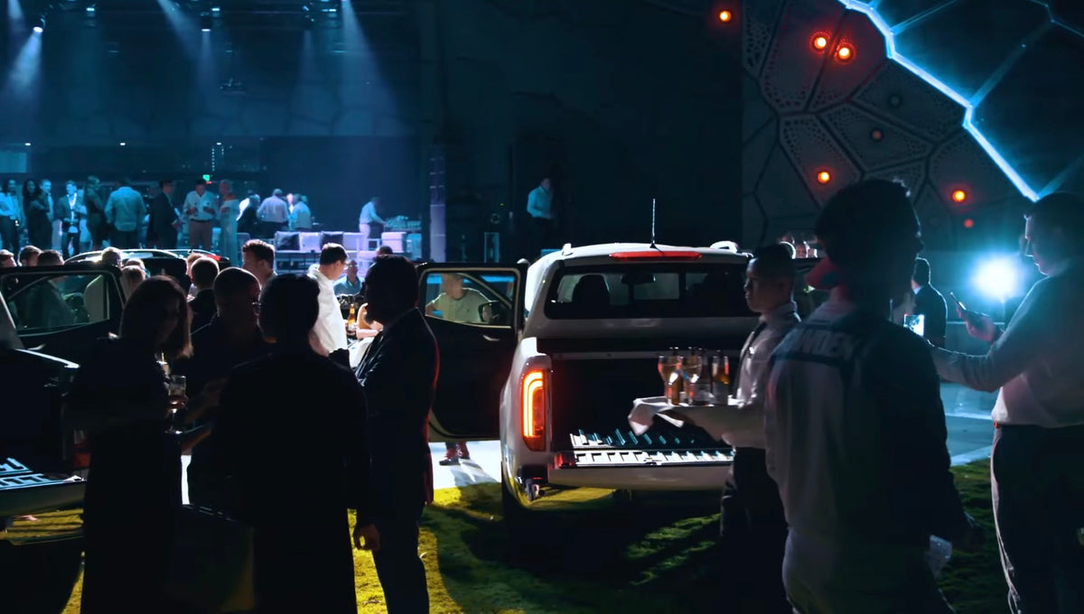 Guests exploring the Mercedes-Benz X-Class vehicles at the launch